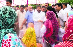 Former minister Gopal Kanda meets people at his residence in Sirsa on Saturday