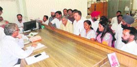 Sachet Kaur Brar (centre) files her nomination papers for the bypoll to ward 8 of the Sirsa Municipal Council on Saturday