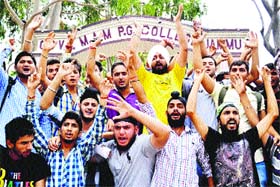 Students of the MAM PG College protest against the rape of mentally challenged girls at the Rotary Inner Wheel Home for Mentally Retarded Children, in Jammu on Saturday