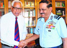 Governor NN Vohra with Air Chief Marshal NAK Browne at the Raj Bhawan in Srinagar on Saturday