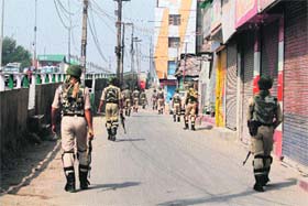 CRPF personnel patrol Lal Chowk in Srinagar on Saturday