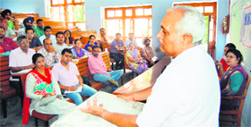 Acharya Paras Ram Vashisht addresses a seminar on astrology and remedial measures in Amritsar on Sunday.