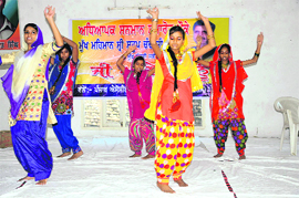 Students perform a dance at a felicitation programme in Bathinda on Sunday. 