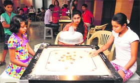 A carrom match in progress at St Stephens School, Sector 45, in Chandigarh on Sunday