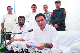 PWD and Industries Minister Randeep Singh Surjewala addresses a press conference after laying the foundation stone of a Rs 30.4-crore indoor stadium in Sector 21, HUDA, Kaithal on Sunday.