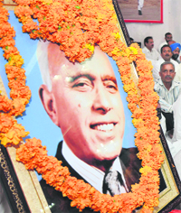 sher-e-kashmir remembered: National Conference leaders attend a function to pay tribute to Sheikh Mohammad Abdullah on his 31st death anniversary at the party headquarters in Jammu on Sunday.