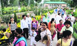 Tourists visit the Shalimar Garden in Srinagar on Sunday.