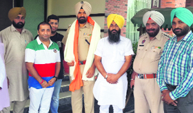 Social activists felicitate DSP, Amargarh, Gurmit Singh, at Ahmedgarh.
