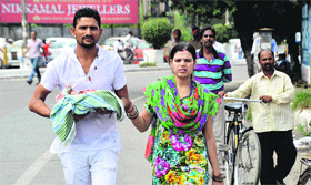 The parents of an infant, who was to be taken to DMCH for treatment, face harassment at the hands of protesters.