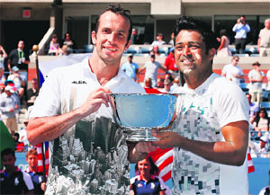 Leander Paes (R) of India and Radek Stepanek of the Czech Republic with the trophy after winning the US Open men's doubles title on Sunday. 