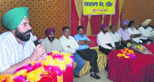 Gurpreet Singh Maluka, chairman, Zila Parishad, addresses a meeting of the Bathinda Jewellers Association. 