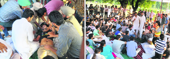 (Left) Amrinder Brar, a student of the Law Department, falls unconscious due to fasting; and students on an indefinite fast at the PU in Chandigarh on Monday.