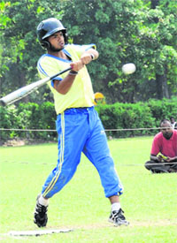 A player of SGGS College, Sector 26, Chandigarh, hits the ball during the Inter-College Baseball Tournament at Panjab University on Monday.