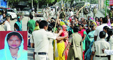 The police officers try to control the protesters at Model Town, north Delhi, where a woman (inset) found murdered, on Monday.