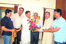 Principal, Delhi Public School, Kishan Chand Pandey, being felicitated by the Citizens Forum in Haridwar on Monday. 