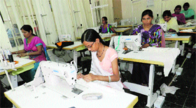 Women learn skills for manufacturing apparel in the Apparel Training and Design Centre set-up in Sirsa.