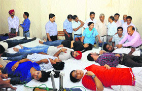 Students of Dyal Singh College donate blood in Karnal on Monday. 