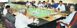 Chief Minister Omar Abdullah chairs the Jammu and Kashmir State Overseas Employment Corporation Limited meeting in Srinagar on Monday. A Tribune photo 