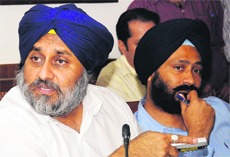Deputy CM Sukhbir Badal with Finance Minister PS Dhindsa in Chandigarh on Monday.