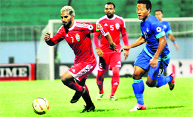 India, Maldives players vie for the ball during the SAFF Football Championship in Kathmandu.