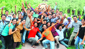 Students of Guru Nanak Dev University in a jubilant mood after getting placement in Tata Consultancy Services in Amritsar on Tuesday.