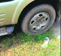 The victims slipper lies near the vehicle on which a high-tension wire fell in Sector 4, Panchkula, on Tuesday. 