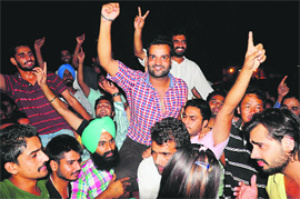 NSUI leaders and activists celebrate after winning the executive committee elections at Panjab University on Tuesday.