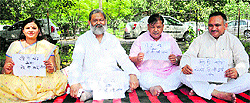 Haryana BJP legislators protest in front of the Vidhan Sabha in Chandigarh on Tuesday