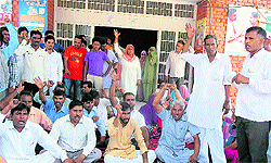 The protesters on a dharna in Kalayat on Tuesday