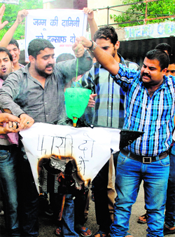 Activists of the Jammu Kashmir Democratic Front demand capital punishment for rapists in Jammu on Tuesday.