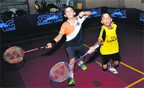 Players in action during the 28th Jammu District Badminton Championship in Jammu on Tuesday.