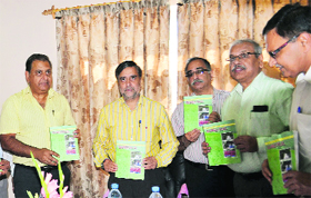 Minister for Forest Mian Altaf Ahmad releases a book, Biodiversity Studies in Gurez, in Srinagar on Tuesday.