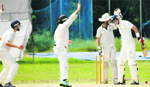 Mohali players appeal against a Ludhiana batsman on the second day of a cricket match for the Katoch Shield being played at the PAU in Ludhiana on Tuesday. 