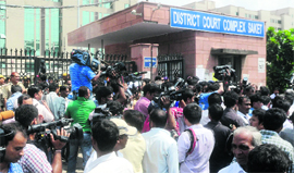 Media outside the Saket District Court during a hearing in the December 16 Delhi gang-rape case, in New Delhi on Tuesday.