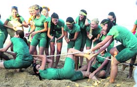 Tough contest: Miss World contestants participate in a tug-of-war in Bali, Indonesia, on Tuesday. The contest began last Sunday