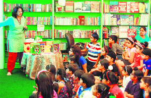 Anushka Ravishankar addresses children during a workshop at One Up Library in Amritsar. 