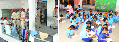 Police personnel have occupied four rooms on the first floor of Government Elementary School in Parasram Nagar. The school authorities have no option but to seat the students in the corridor (pic below). Tribune photos: Pawan Sharma
