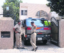 Police personnel outside KL Khanna's residence in Sector 30, Chandigarh, on Wednesday. 