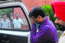 Sukhdev Sharma in the CBI custody in Chandigarh on Wednesday.