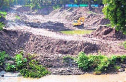 Ganga canal expansion work on the Mayapur link channel by the UP Irrigation Department under way in Haridwar on Wednesday. Tribune photo: Rameshwar Gaur