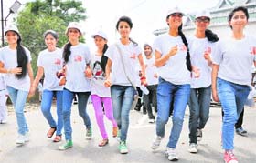Run for fun: Youth participate in the "Bharat Jago" race organised by the RSS in Dharamsala on Wednesday