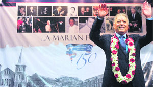 Mumbai-born music maestro and composer Zubin Mehta waves towards students after arriving at St Mary's School, his alma mater, in Mumbai, on Wednesday.