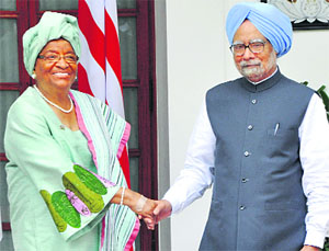 Liberian President Ellen Johnson Sirleaf with Prime Minister Manmohan Singh after a meeting in New Delhi on Wednesday.