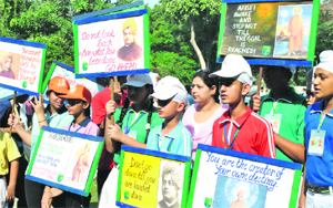 College and school students hold an awareness rally to mark the 150 years of Swami Vivekanandas birth anniversary at the Rajiv Gandhi National University of Law in Patiala on Wednesday. Tribune photo: Rajesh Sachar