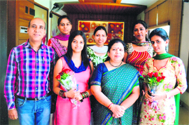 Neelam Kamra, principal, BBK DAV College for Women, with students Dilkiran Kaur, Rupali Malhotra and Sandeep Kaur in Amritsar on Thursday. 