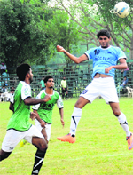 Players in action during an inter-college football tournament at Panjab University on Thursday. Tribune Photo: Pradeep tewari