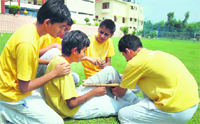 Students take part in a workshop on first aid at Lawrence Public Senior Secondary School, Mohali, on Thursday. A Tribune photograph