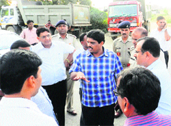 Jhajjar DC Ajit Balaji Joshi directs officials of various departments while inspecting the new bypass in Jhajjar. Photo by writer