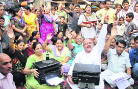 Residents of Saidan Gate, Jalandhar, hold a dharna on Thursday