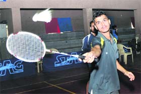 Player in action during the Jammu District Badminton Championship in Jammu on Thursday